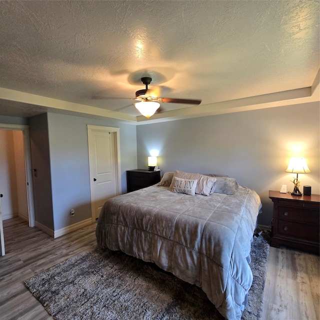 104 39th Ave NE, Great Falls, MT 59404 - bedroom with wood finished floors, a textured ceiling, and ceiling fan