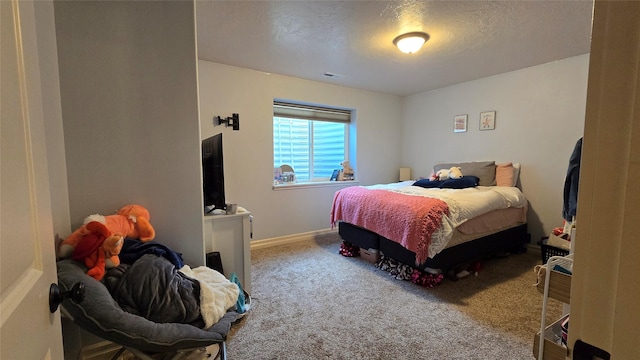 104 39th Ave NE, Great Falls, MT 59404 - carpeted bedroom featuring a textured ceiling and baseboards