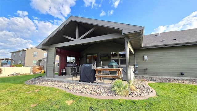 104 39th Ave NE, Great Falls, MT 59404 - back of property featuring a patio and roof with shingles