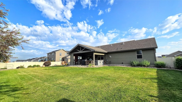 104 39th Ave NE, Great Falls, MT 59404 - rear view of house with a fenced backyard and a patio