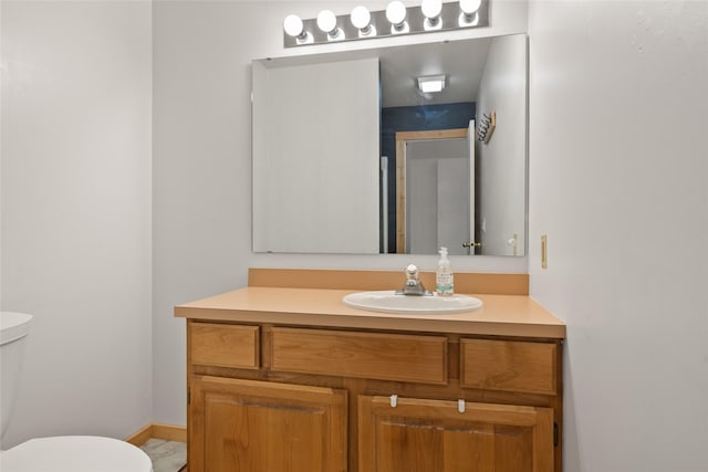 251 Grandview Way, Missoula, MT 59803 - half bathroom featuring toilet and vanity