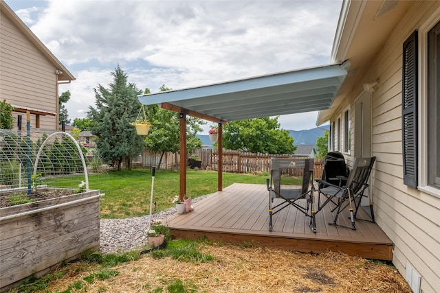 251 Grandview Way, Missoula, MT 59803 - wooden deck featuring a fenced backyard and a mountain view