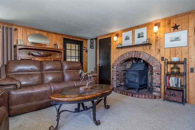 429 Pleasant Valley Rd, Marion, MT 59925 - carpeted living room featuring wooden walls and a wood stove