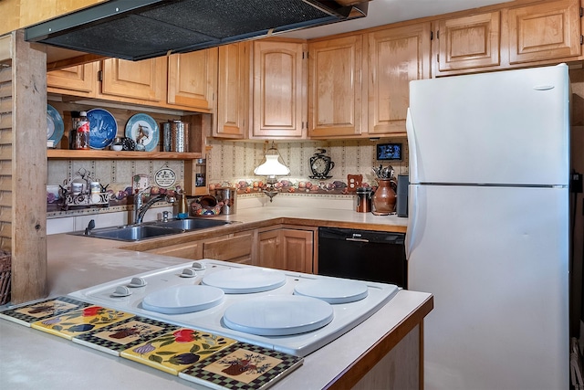 429 Pleasant Valley Rd, Marion, MT 59925 - kitchen with freestanding refrigerator, black dishwasher, extractor fan, light countertops, and open shelves