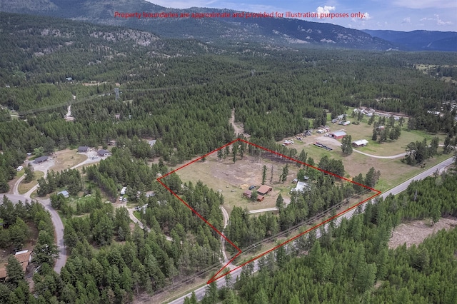 429 Pleasant Valley Rd, Marion, MT 59925 - aerial view of property and surrounding area featuring mountains and property boundaries highlighted