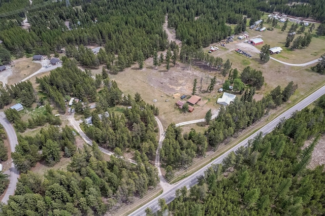 429 Pleasant Valley Rd, Marion, MT 59925 - aerial overview of property's location with a heavily wooded area
