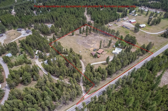 429 Pleasant Valley Rd, Marion, MT 59925 - view of property location with property parcel outlined and a heavily wooded area
