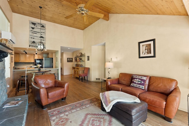 7 Eagle Bend Dr, Bigfork, MT 59911 - living area with wood finished floors, a wooden ceiling with exposed beams, a ceiling fan, and high vaulted ceiling