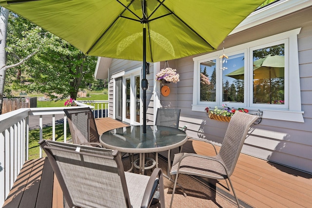 7 Eagle Bend Dr, Bigfork, MT 59911 - wooden deck featuring outdoor dining space