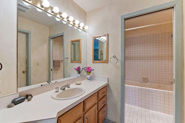 7 Eagle Bend Dr, Bigfork, MT 59911 - full bath featuring vanity, tiled shower / bath, and tile patterned floors