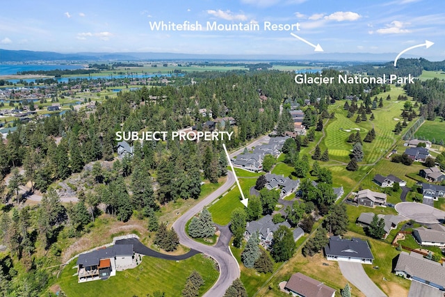 7 Eagle Bend Dr, Bigfork, MT 59911 - view of property location with a large body of water and nearby suburban area