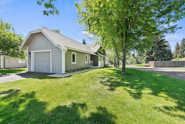 7 Eagle Bend Dr, Bigfork, MT 59911 - view of property exterior with asphalt driveway and a shingled roof