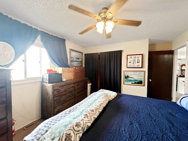 643 Madison Way, Great Falls, MT 59404 - bedroom featuring a textured ceiling and ceiling fan