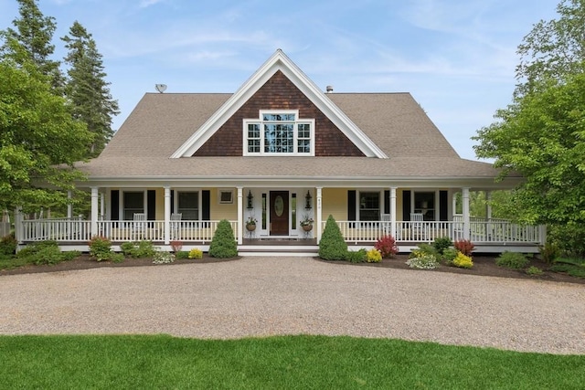 420 Little Creek Ln, Whitefish, MT 59937 - farmhouse featuring covered porch and roof with shingles