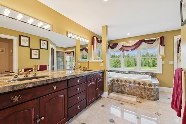 420 Little Creek Ln, Whitefish, MT 59937 - full bathroom featuring double vanity, a bath, tile patterned floors, and recessed lighting