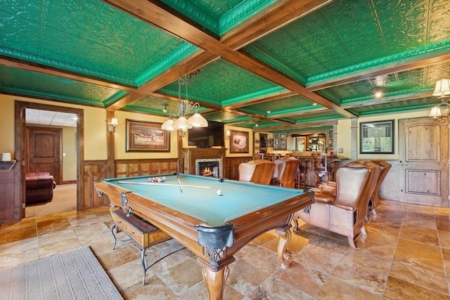 420 Little Creek Ln, Whitefish, MT 59937 - recreation room featuring billiards, beam ceiling, a lit fireplace, coffered ceiling, and wainscoting
