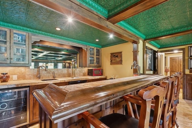 420 Little Creek Ln, Whitefish, MT 59937 - indoor wet bar featuring beverage cooler, decorative backsplash, an ornate ceiling, recessed lighting, and dishwasher