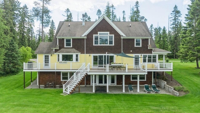 420 Little Creek Ln, Whitefish, MT 59937 - rear view of property with a patio area, a wooden deck, stairway, and a yard