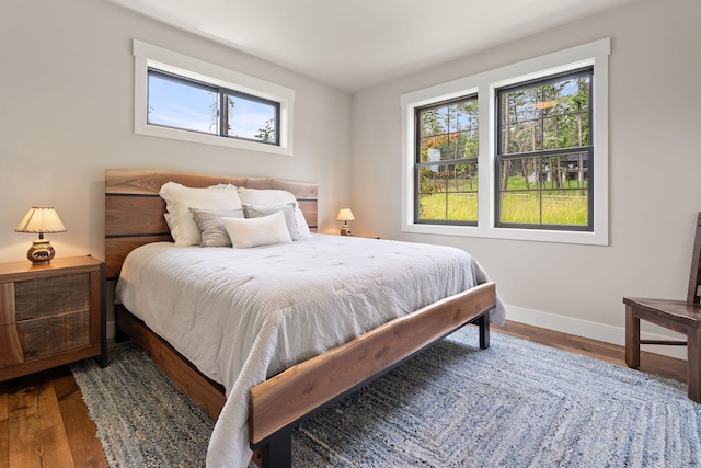 331 Deer Creek Rd, Somers, MT 59932 - bedroom with baseboards and wood finished floors