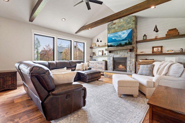 331 Deer Creek Rd, Somers, MT 59932 - living area featuring wood finished floors, a ceiling fan, a stone fireplace, and recessed lighting