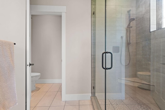 331 Deer Creek Rd, Somers, MT 59932 - bathroom featuring a shower stall and tile patterned flooring