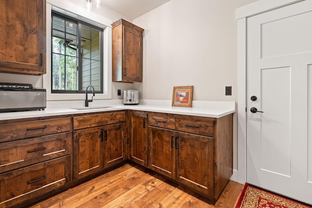 331 Deer Creek Rd, Somers, MT 59932 - kitchen with light wood finished floors and light countertops