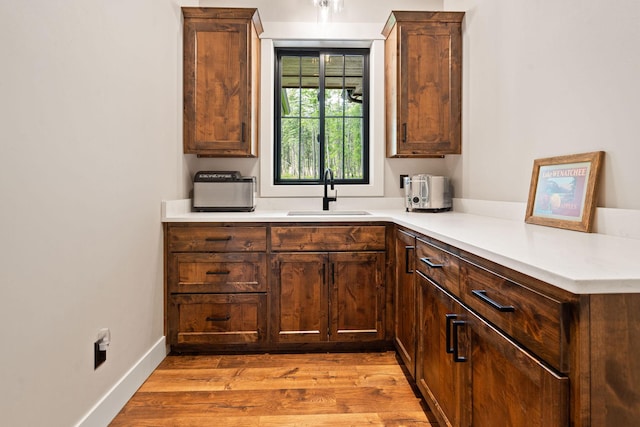 331 Deer Creek Rd, Somers, MT 59932 - kitchen featuring light wood-style flooring and light countertops