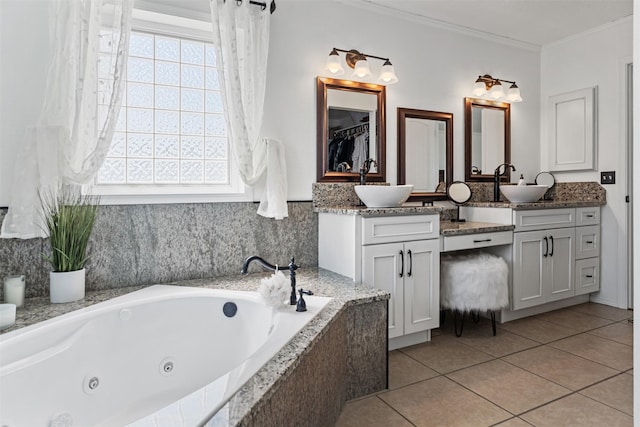 4786 Hereford Ln, Stevensville, MT 59870 - bathroom with double vanity, crown molding, tile patterned floors, and a jetted tub