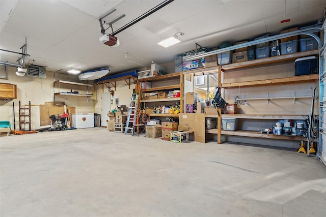 4786 Hereford Ln, Stevensville, MT 59870 - garage with a workshop area and a garage door opener