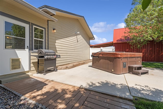 4786 Hereford Ln, Stevensville, MT 59870 - wooden terrace featuring a hot tub, grilling area, and a patio area