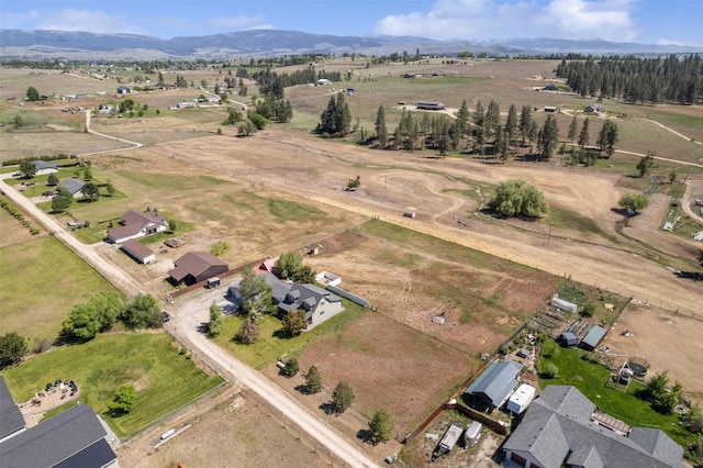 4786 Hereford Ln, Stevensville, MT 59870 - aerial view of property and surrounding area with mountains and rural landscape