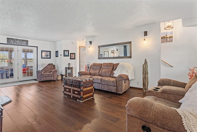 4786 Hereford Ln, Stevensville, MT 59870 - living room featuring dark wood-style floors and a textured ceiling