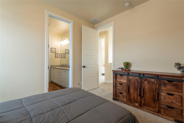 343 Meadow View Loop, East Helena, MT 59635 - bedroom with light colored carpet and ensuite bath