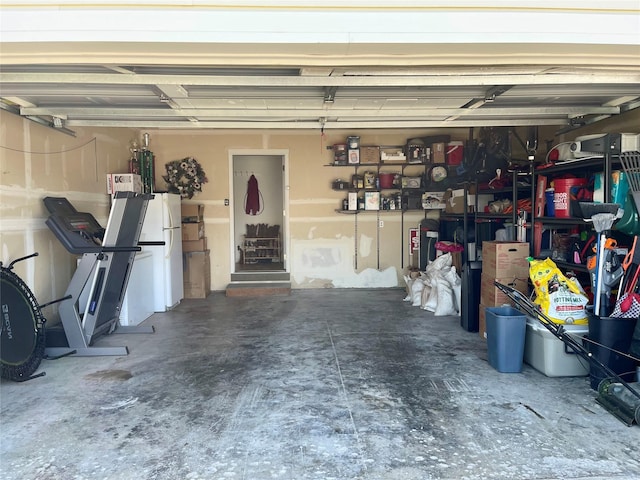 50 Rockefeller Dr, Kalispell, MT 59901 - garage featuring freestanding refrigerator