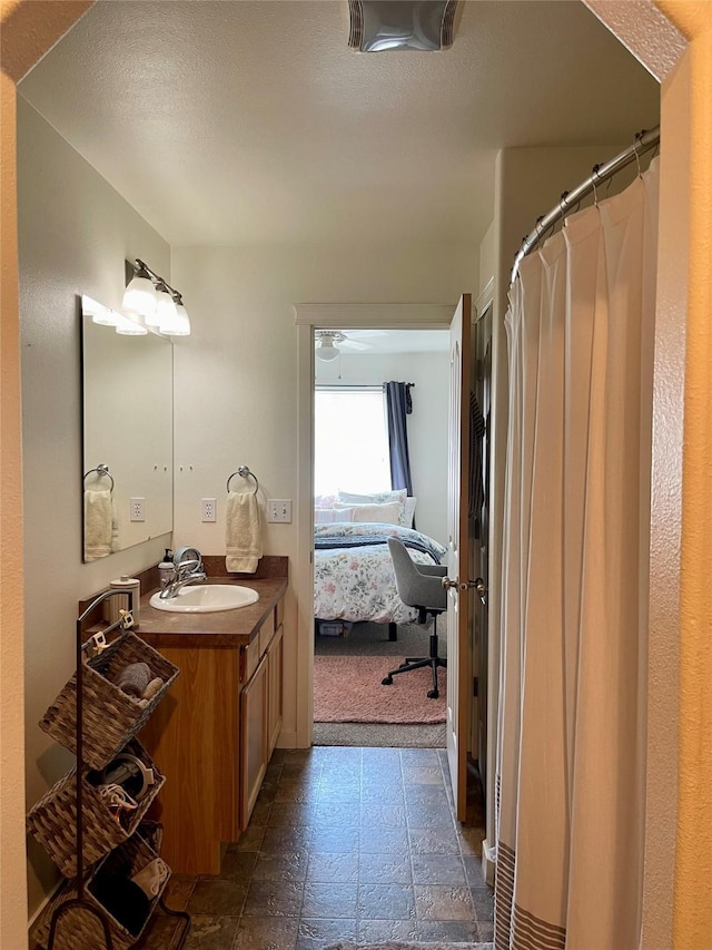 50 Rockefeller Dr, Kalispell, MT 59901 - ensuite bathroom featuring vanity and a shower with shower curtain