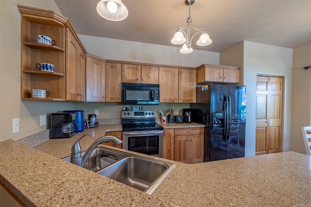 310 Barney St Unit B, Helena, MT 59602 - kitchen with black appliances, open shelves, hanging light fixtures, and a chandelier