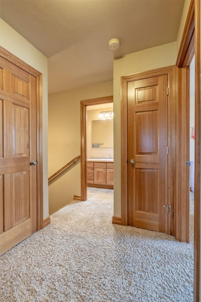 310 Barney St Unit B, Helena, MT 59602 - hallway featuring light colored carpet and baseboards