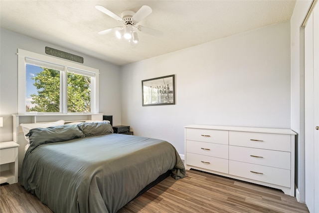 3782 E Riggs St, East Helena, MT 59635 - bedroom with wood finished floors and a ceiling fan