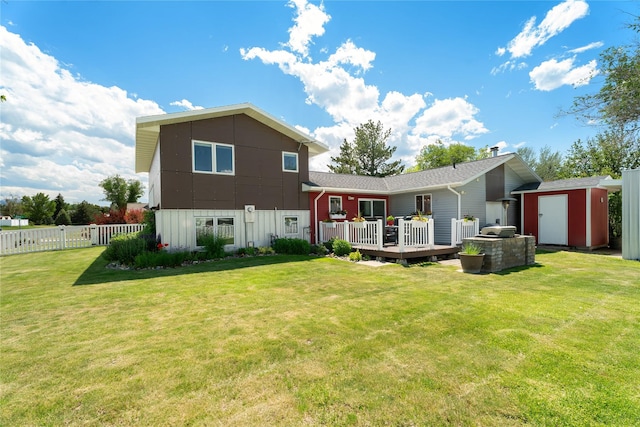 3782 E Riggs St, East Helena, MT 59635 - back of property featuring a storage shed and a wooden deck