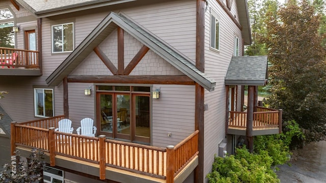 396 N Juniper Bay Rd Unit 15, Somers, MT 59932 - rear view of property with a shingled roof