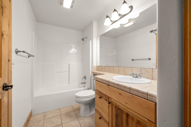 396 N Juniper Bay Rd Unit 15, Somers, MT 59932 - bathroom with vanity, tile patterned flooring, and washtub / shower combination