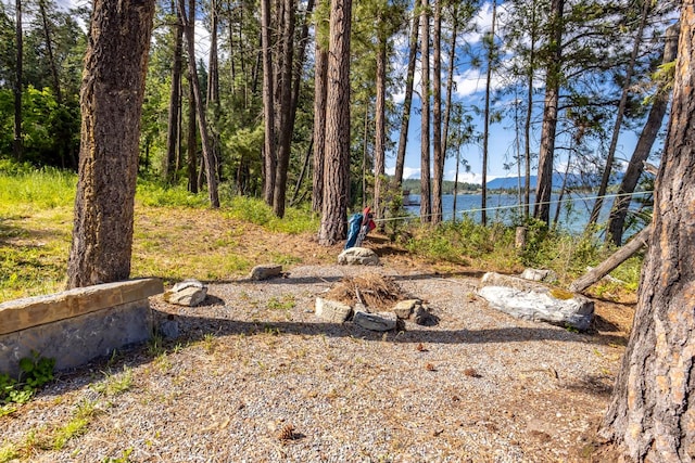 396 N Juniper Bay Rd Unit 15, Somers, MT 59932 - view of yard with a water and mountain view