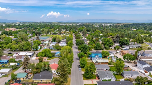 1120 8th Ave E, Kalispell, MT 59901 - aerial view of residential area with a mountain backdrop