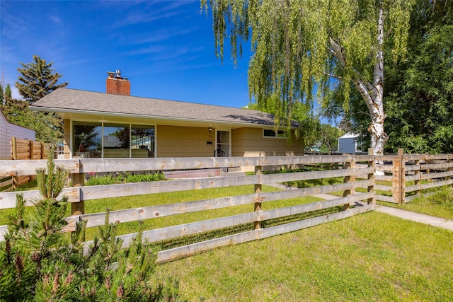 1120 8th Ave E, Kalispell, MT 59901 - ranch-style house featuring a chimney