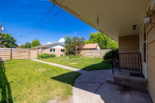 1120 8th Ave E, Kalispell, MT 59901 - fenced backyard with a patio