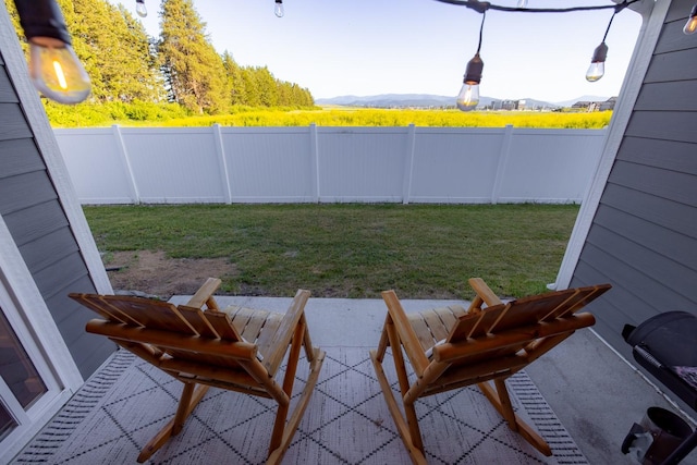 546 Sparrow Rd, Kalispell, MT 59901 - fenced backyard with a mountain view