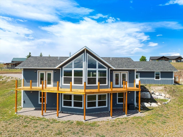 132 Skyview Ln, Polson, MT 59860 - rear view of property with french doors, a deck, a yard, and a patio
