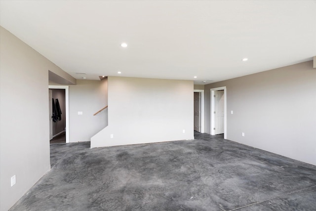 132 Skyview Ln, Polson, MT 59860 - spare room featuring recessed lighting, concrete floors, and stairway