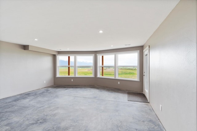 132 Skyview Ln, Polson, MT 59860 - spare room featuring unfinished concrete floors and recessed lighting