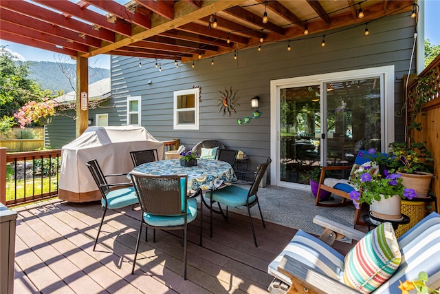 1346 Lilly Ct, Missoula, MT 59802 - deck with a pergola, outdoor dining space, area for grilling, and a mountain view